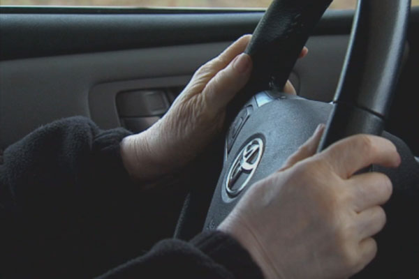 hands on a steering wheel