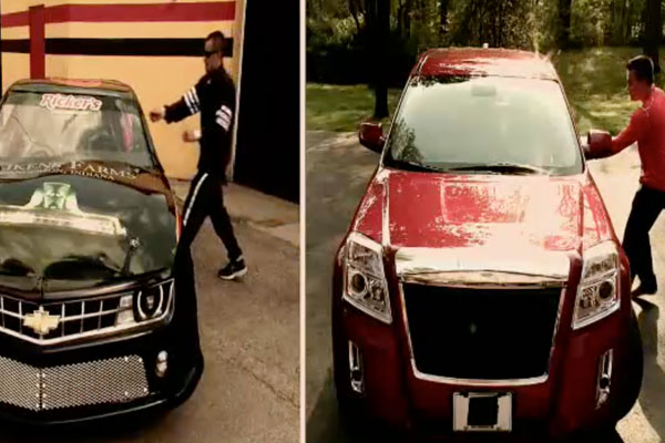 a race car driver getting into his car next to a regular driver getting into his car